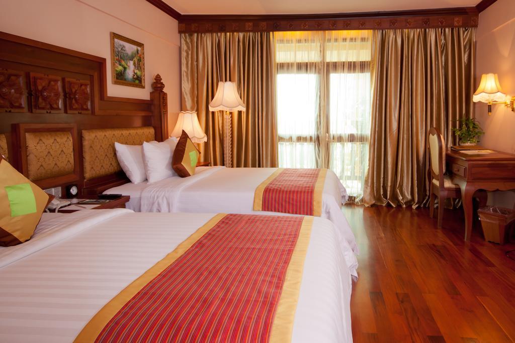 Angkor Era Hotel Ciudad de Siem Riep Habitación foto
