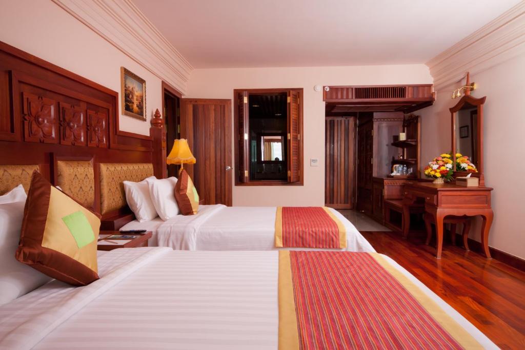 Angkor Era Hotel Ciudad de Siem Riep Habitación foto